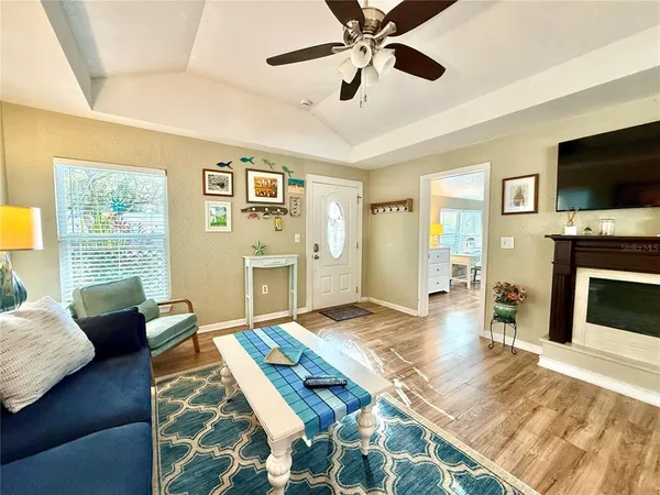 workspace with fireplace and wooden floor