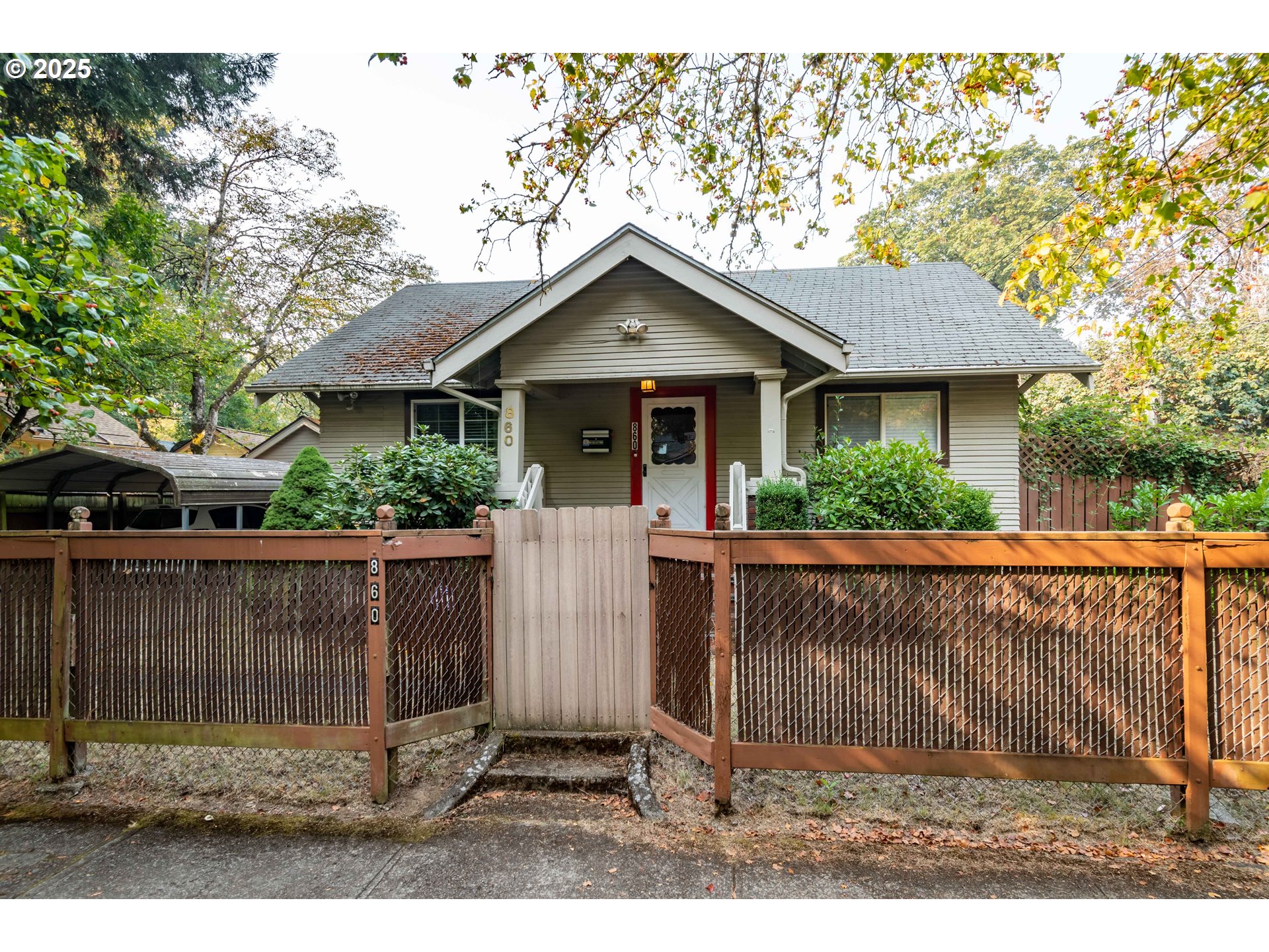 a view of house with roof yard and outdoor seating