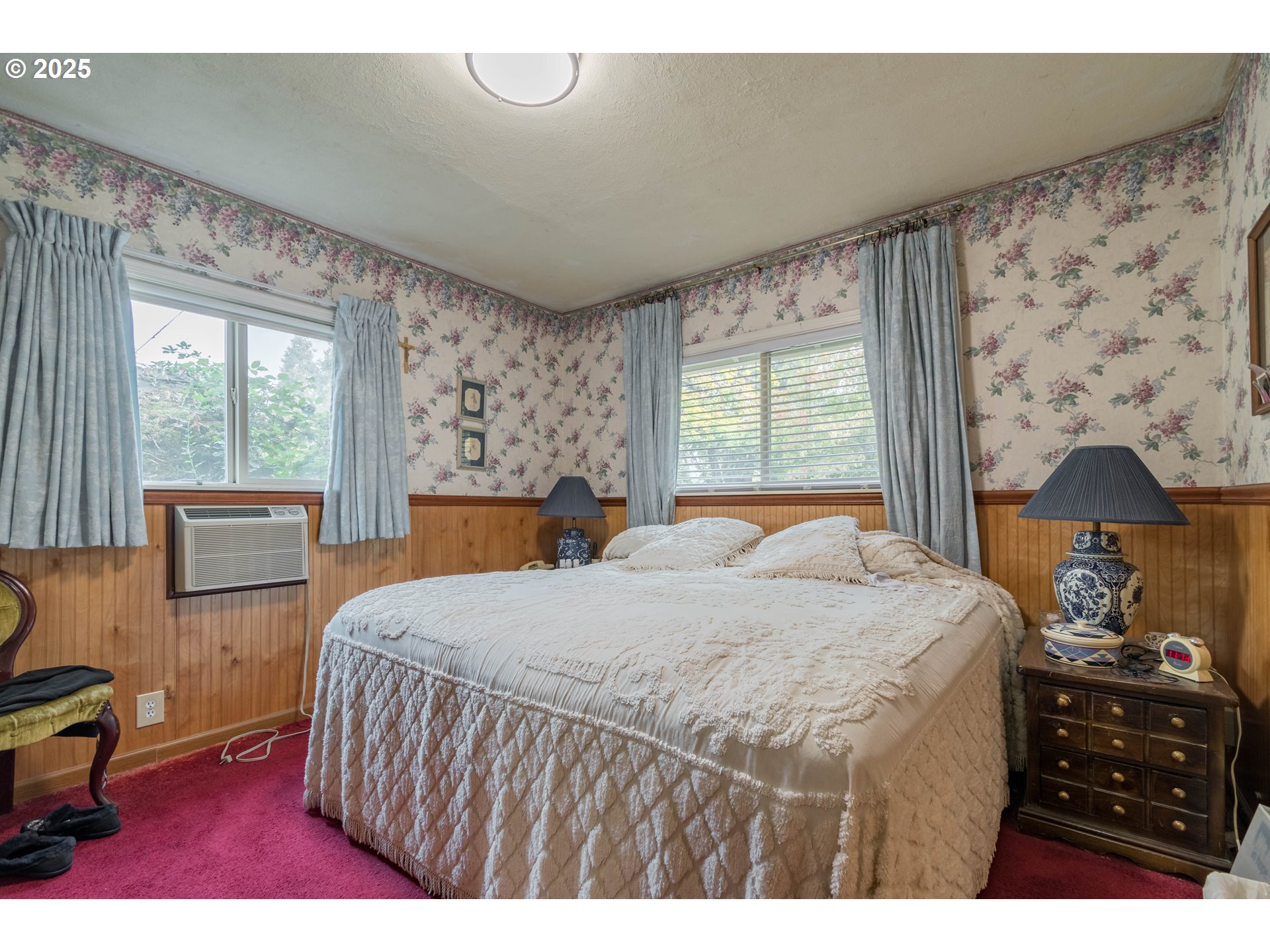 860 Adams Street Eugene, OR 97402 - Photo 15 of 46 a bedroom with a bed a dresser next to a window