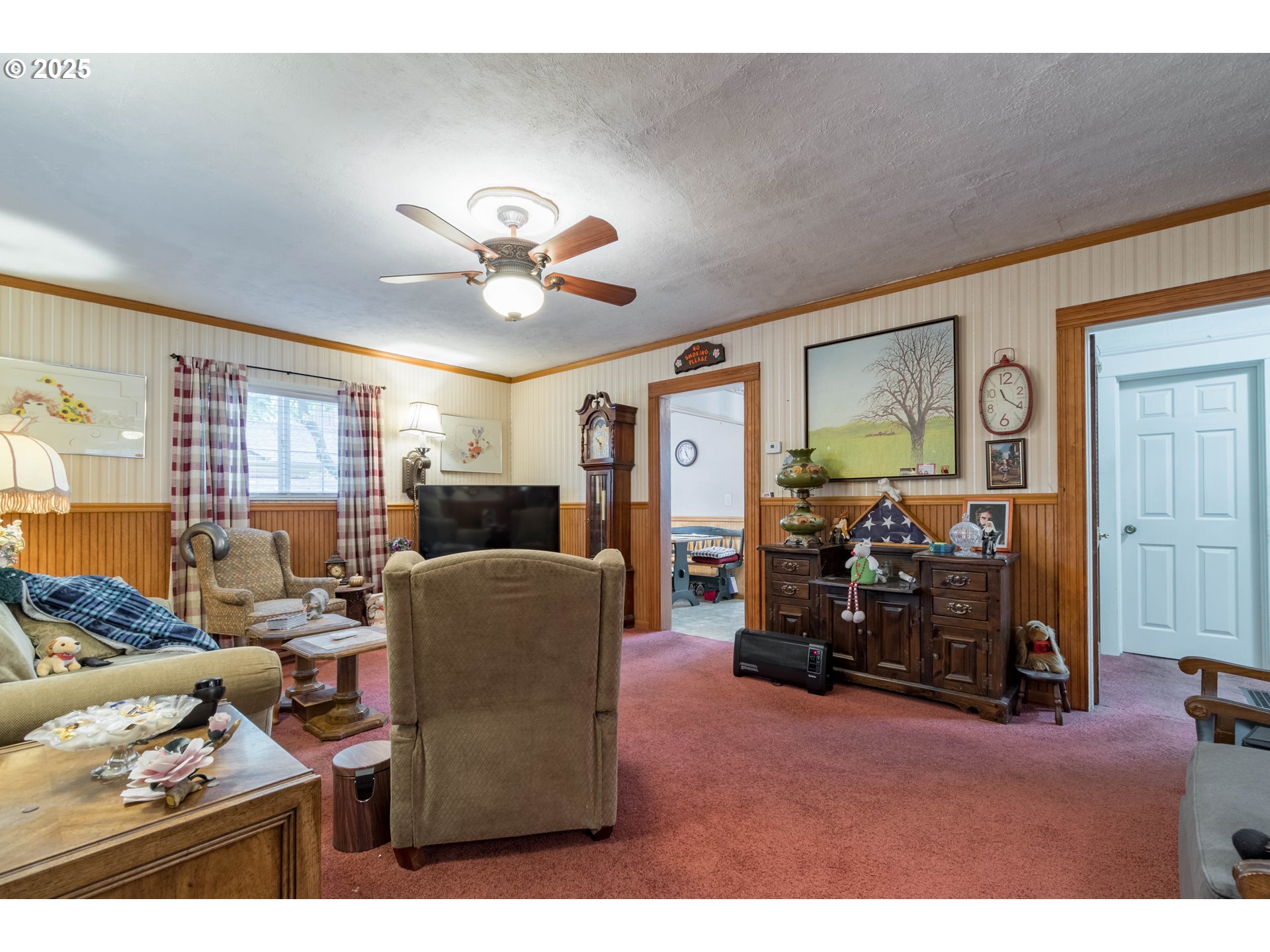 860 Adams Street Eugene, OR 97402 - Photo 3 of 46 a living room with furniture and a large window