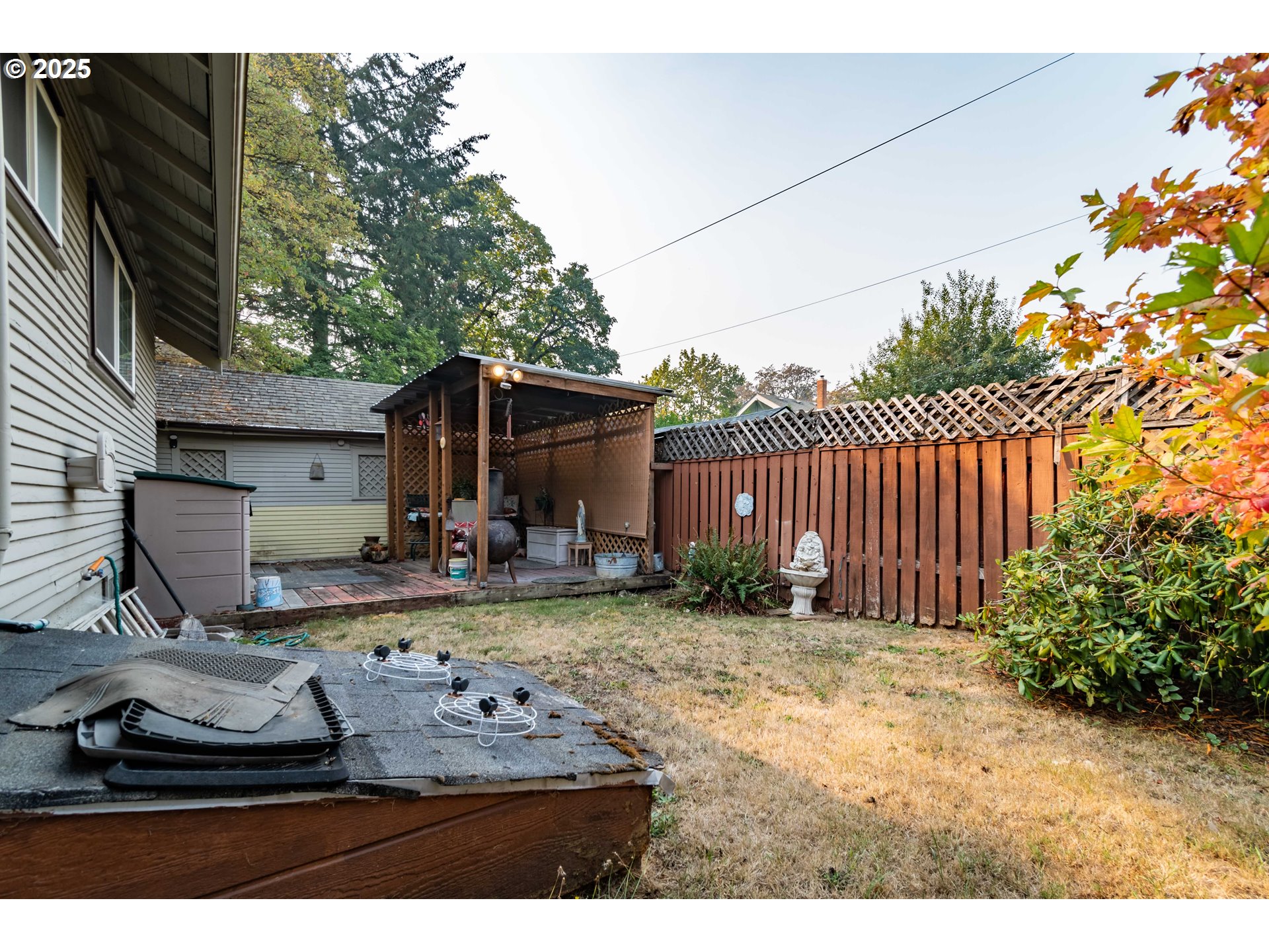 860 Adams Street Eugene, OR 97402 - Photo 37 of 46 a view of a backyard with plants and a patio