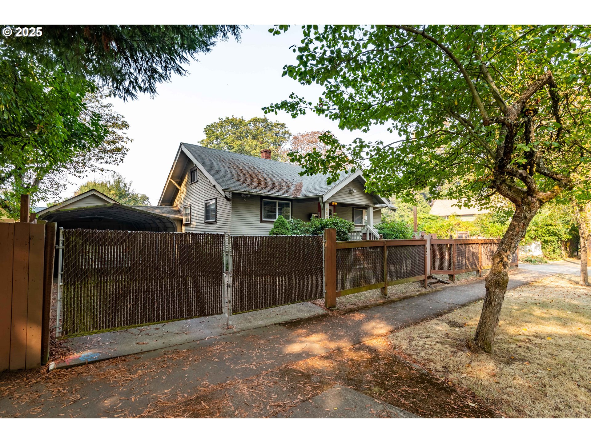 860 Adams Street Eugene, OR 97402 - Photo 41 of 46 a backyard of a house with lots of green space
