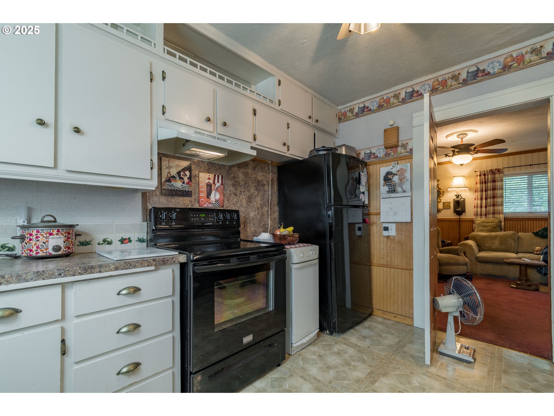 860 Adams Street Eugene, OR 97402 - Photo 10 of 46 a kitchen with stainless steel appliances granite countertop a refrigerator and a stove