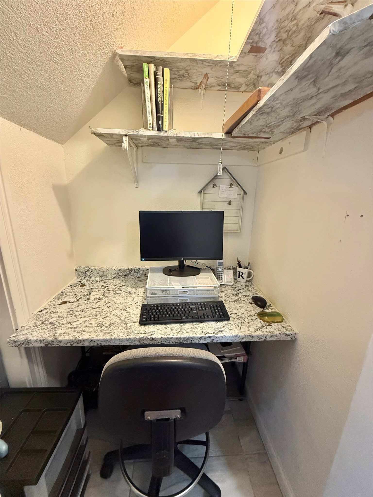 6000 Reims Road, Unit 3010 Houston, TX 77036 - Photo 11 of 28 Downstairs closet converted into a work station