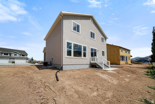 175 West 930 North Santaquin, UT 84655 - Photo 22 of 22 Contemporary two-story residence with a light-colored stucco exterior
