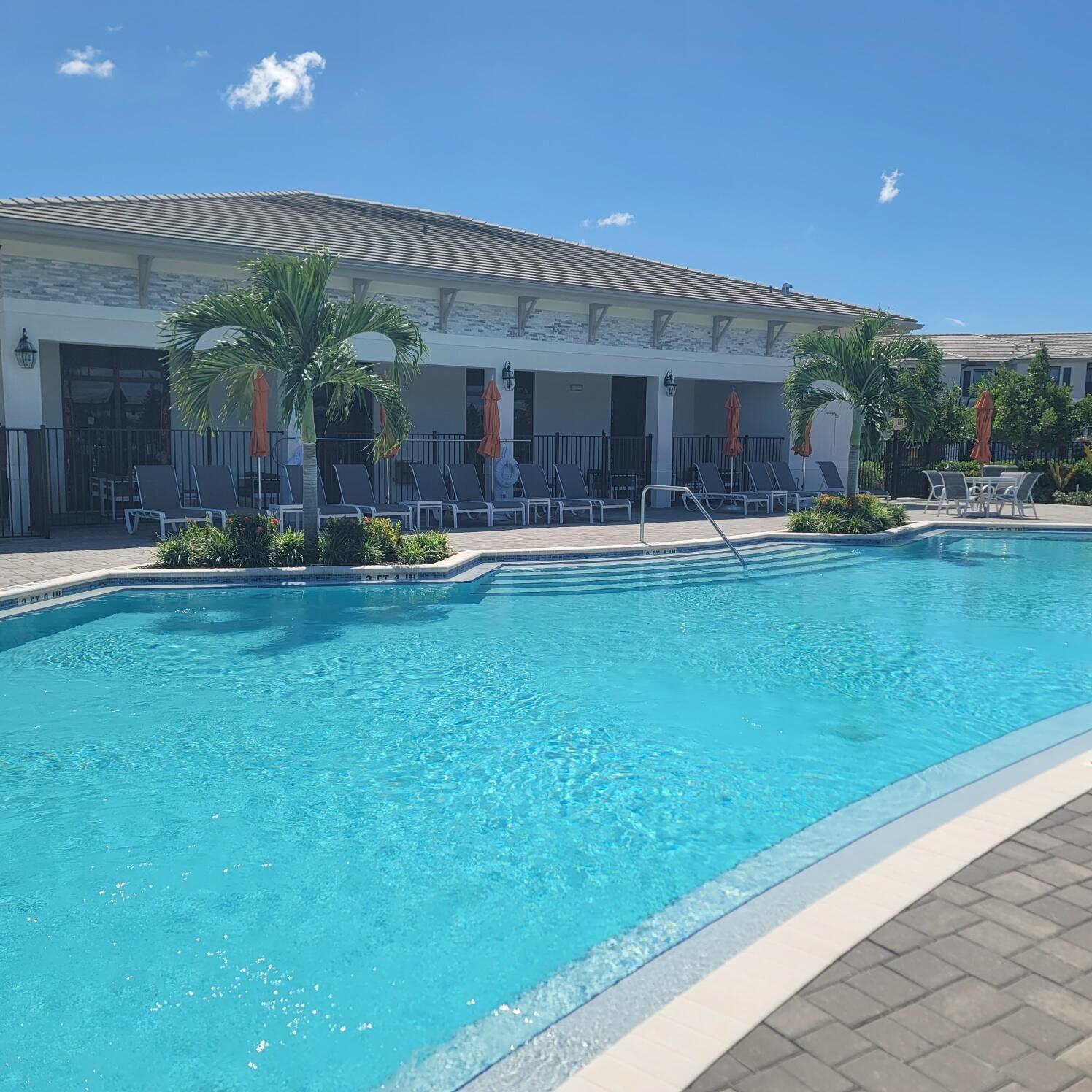 28706 Southwest 133rd Court Homestead, FL 33033 - Photo 1 of 40 a front view of house with yard and outdoor seating