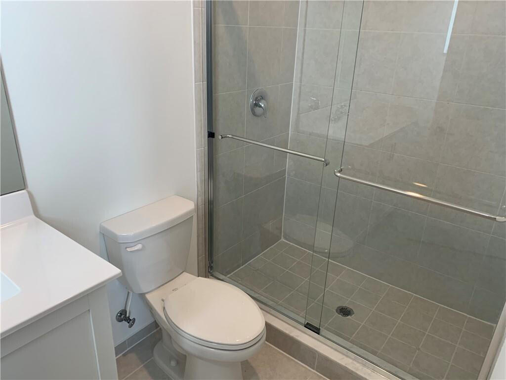 28706 Southwest 133rd Court Homestead, FL 33033 - Photo 15 of 40 a bathroom with a toilet and a shower