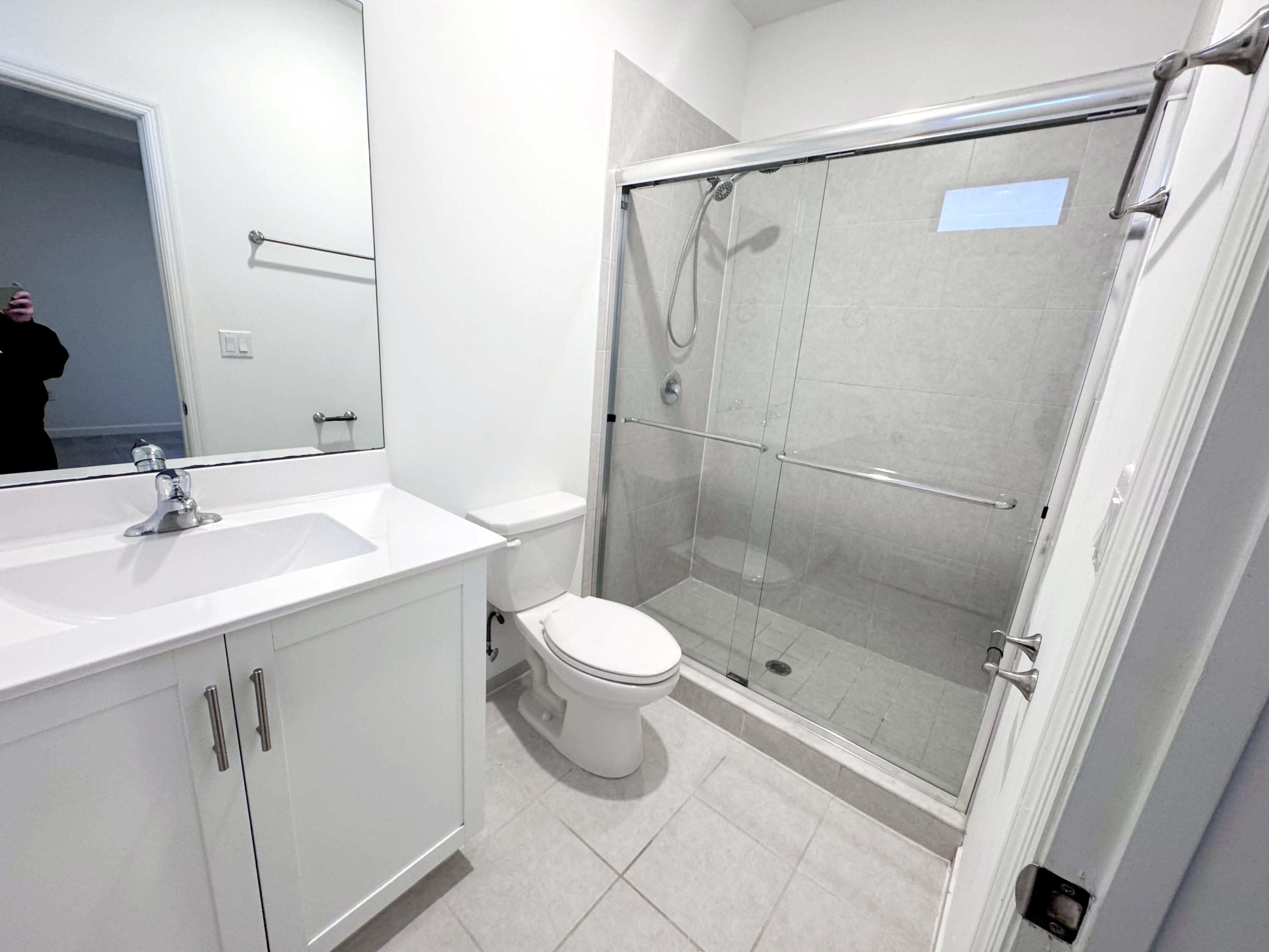 28706 Southwest 133rd Court Homestead, FL 33033 - Photo 25 of 40 a bathroom with a sink toilet and shower