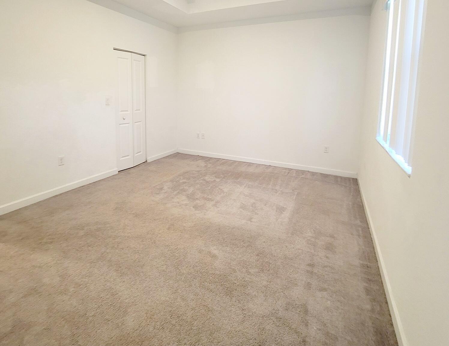 28706 Southwest 133rd Court Homestead, FL 33033 - Photo 27 of 40 an empty room with a natural light