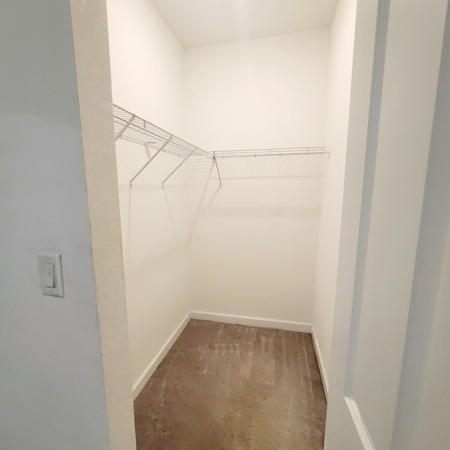 28706 Southwest 133rd Court Homestead, FL 33033 - Photo 29 of 40 a view of a room with racks on the wall