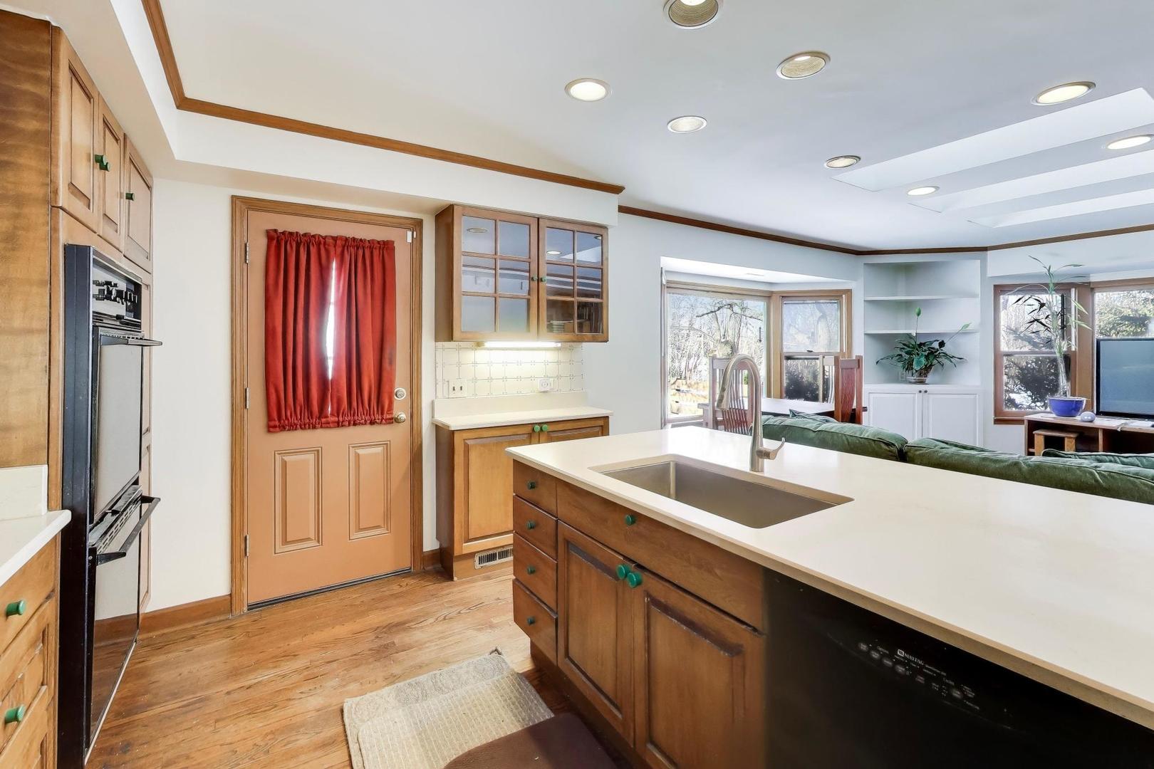 600 Riverwoods Road Mettawa, IL 60045 - Photo 20 of 49 a kitchen with a sink and large window