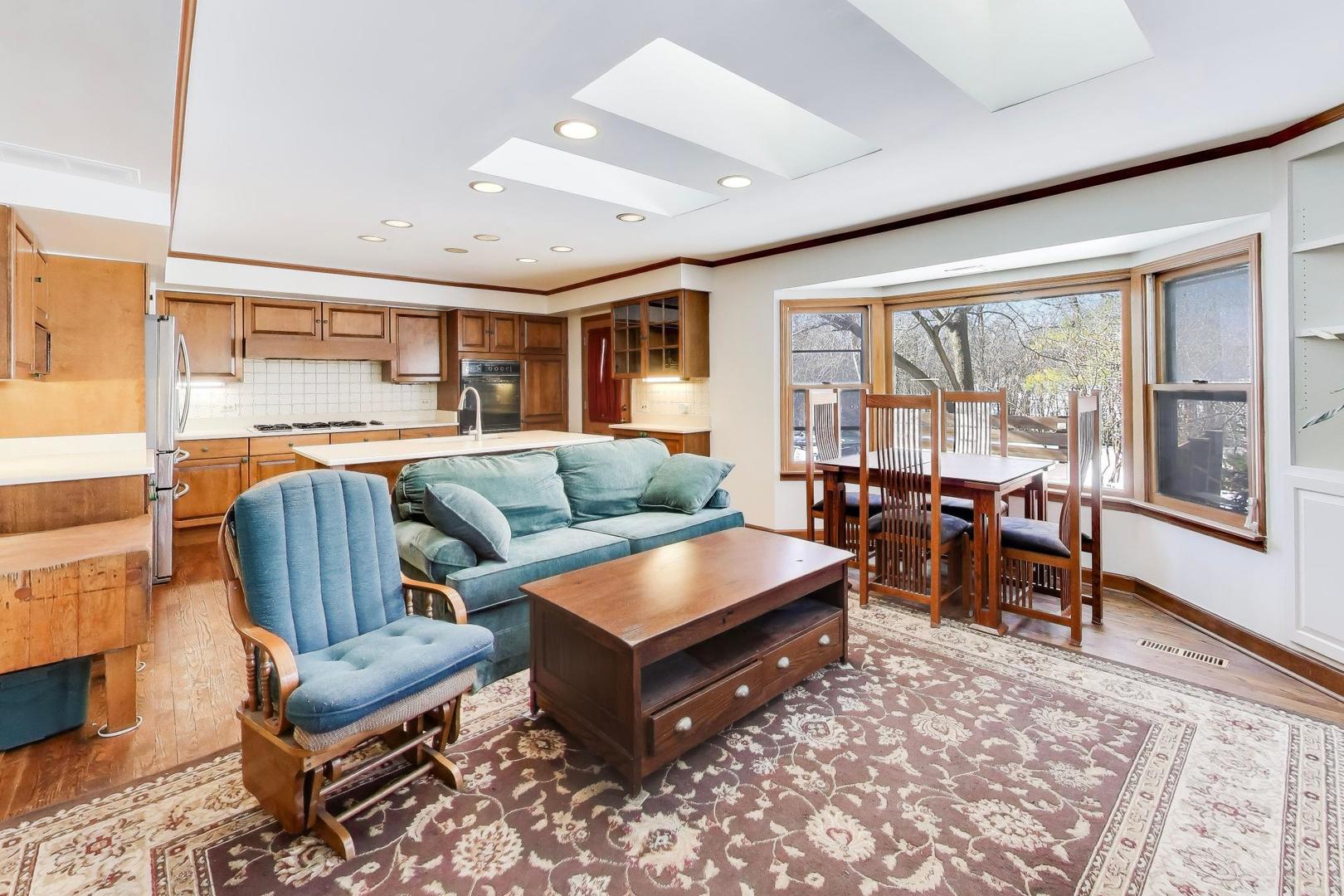 600 Riverwoods Road Mettawa, IL 60045 - Photo 21 of 49 a living room with furniture and a large window