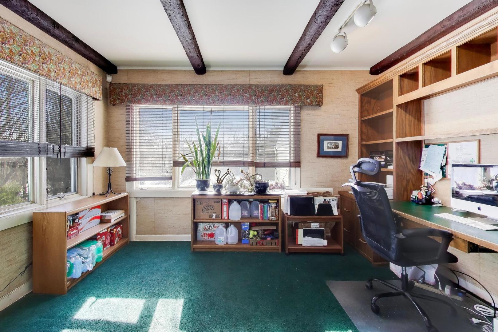 600 Riverwoods Road Mettawa, IL 60045 - Photo 24 of 49 a living room with furniture and a dining table