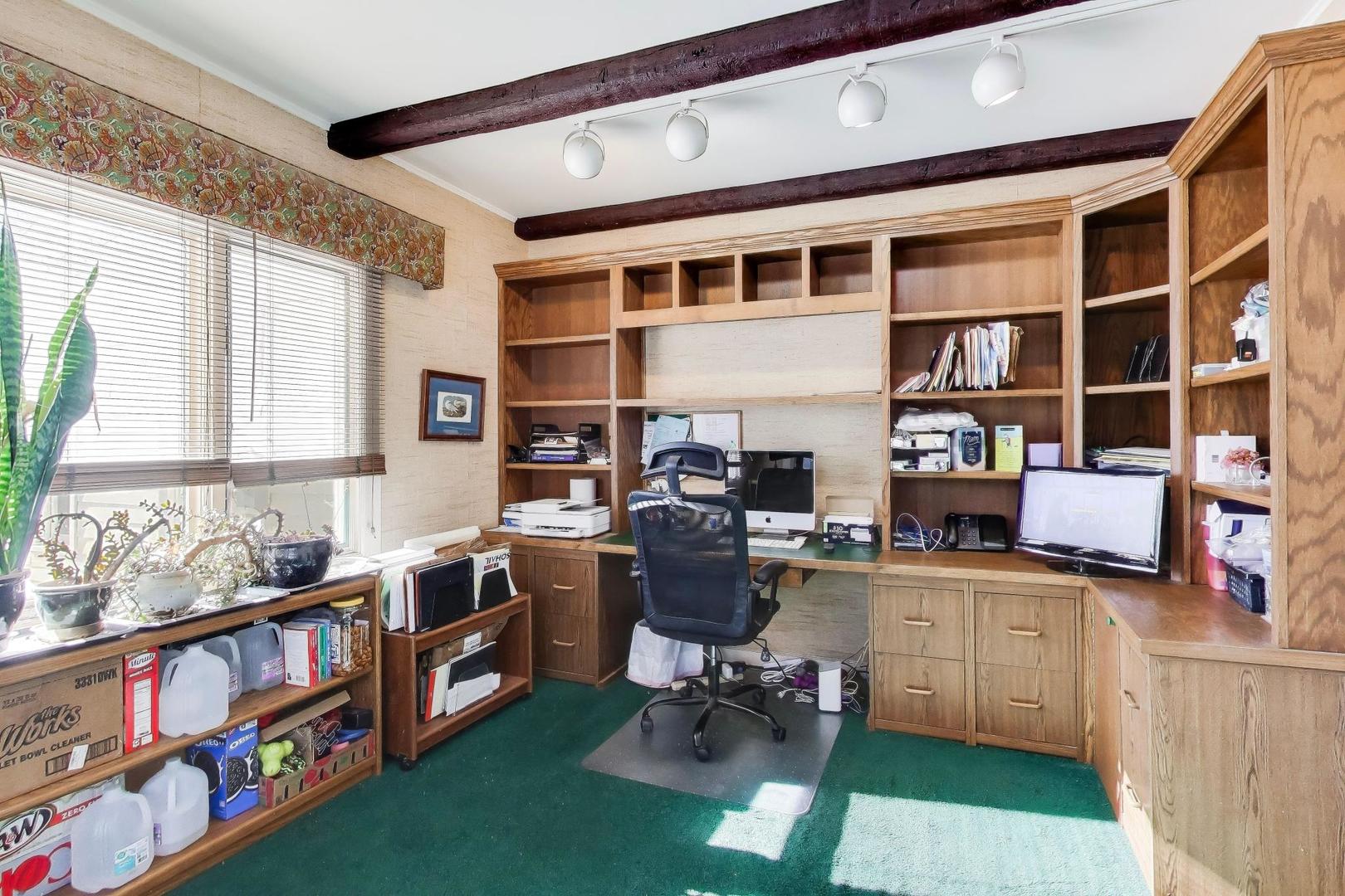 600 Riverwoods Road Mettawa, IL 60045 - Photo 25 of 49 a view of a workspace with furniture and a window