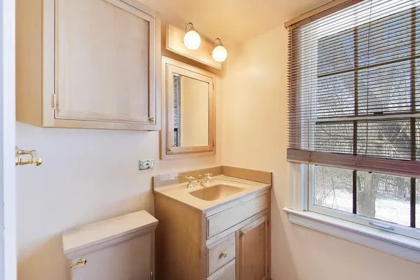 a bathroom with a sink and a toilet