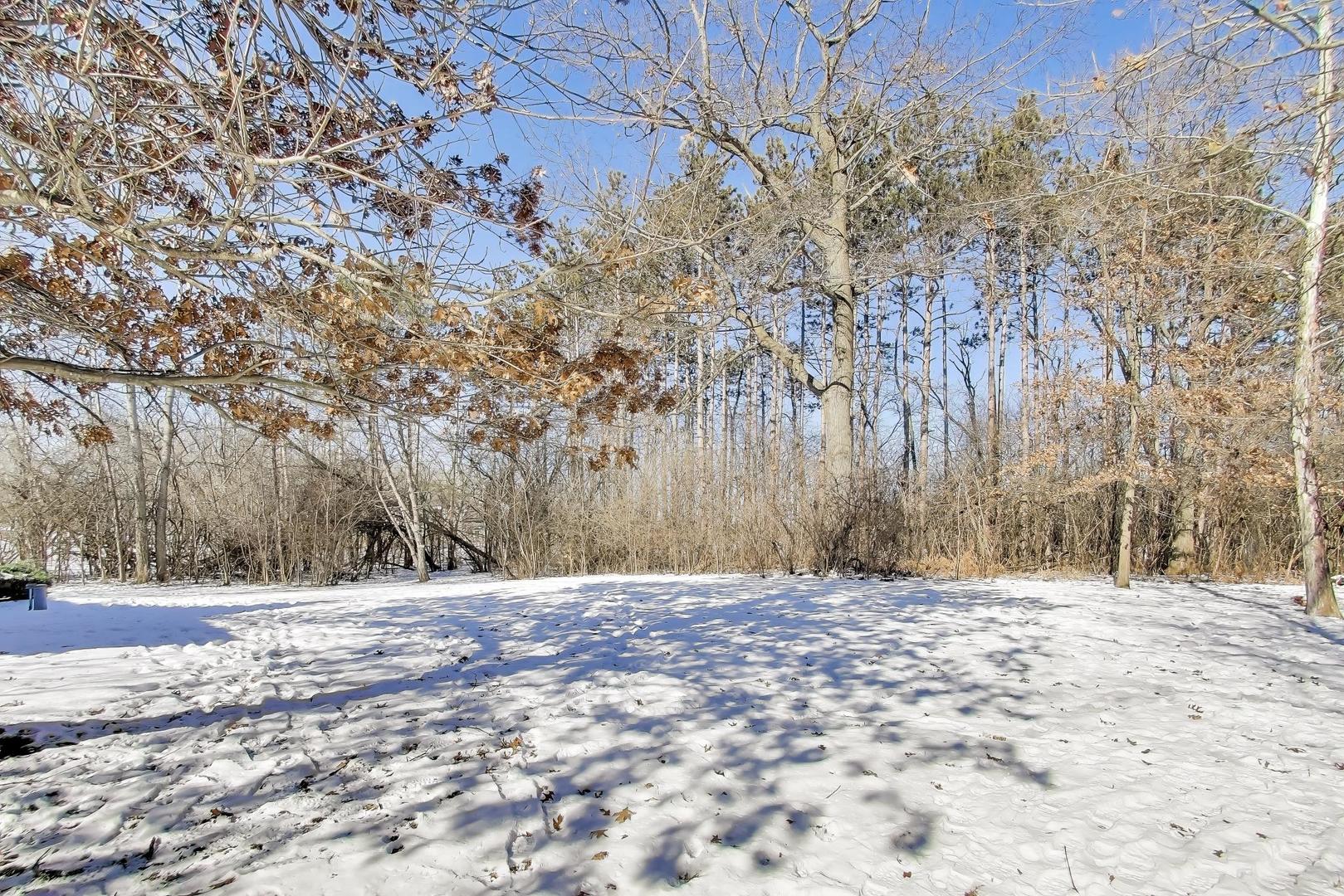 600 Riverwoods Road Mettawa, IL 60045 - Photo 44 of 49 a view of tree with a wooden fence