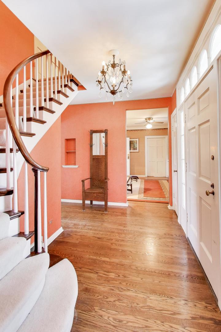 600 Riverwoods Road Mettawa, IL 60045 - Photo 9 of 49 a view of an entryway with wooden floor