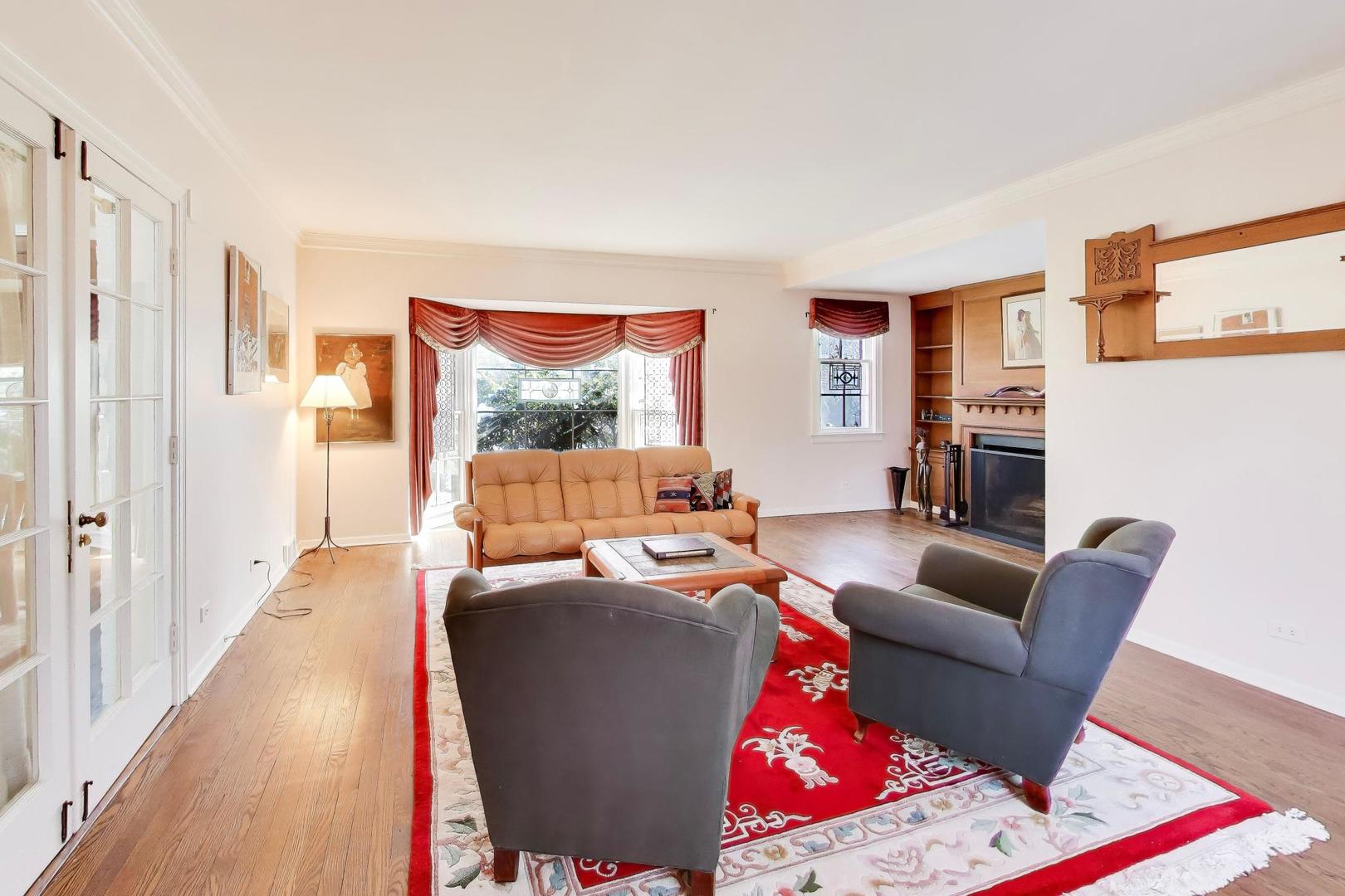 600 Riverwoods Road Mettawa, IL 60045 - Photo 10 of 49 a living room with furniture rug and wooden floor