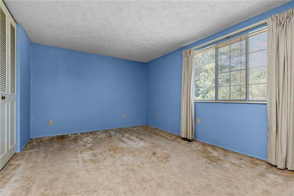 300 Moon Ridge Drive Freedom, PA 15042 - Photo 16 of 32 an empty room with a window