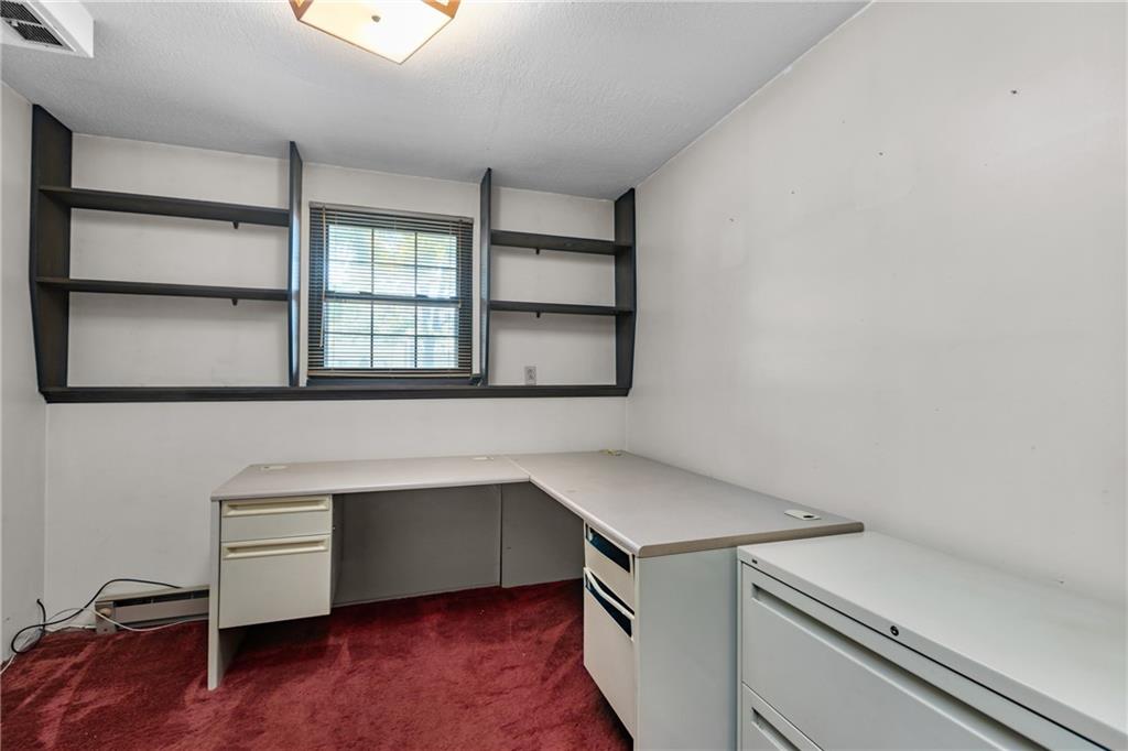 300 Moon Ridge Drive Freedom, PA 15042 - Photo 22 of 32 a hallway with a wooden floor and a window