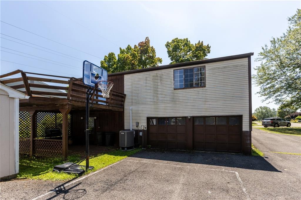 300 Moon Ridge Drive Freedom, PA 15042 - Photo 29 of 32 a view of a house with a yard and potted plants