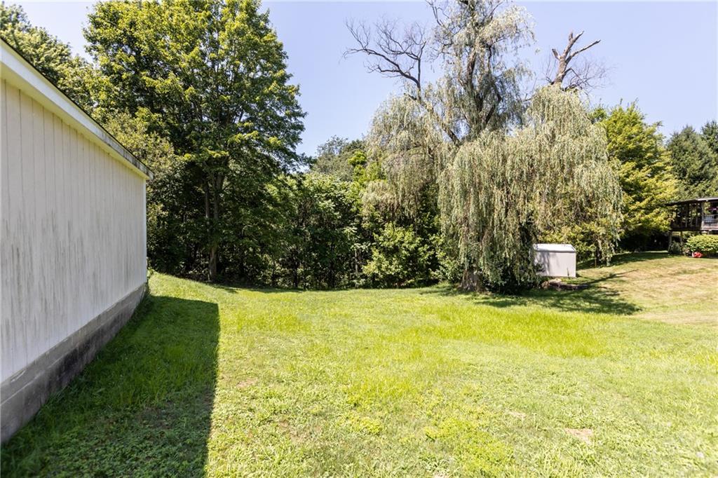300 Moon Ridge Drive Freedom, PA 15042 - Photo 31 of 32 a view of a back yard with green space