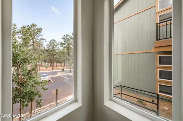 a view of a door and a window
