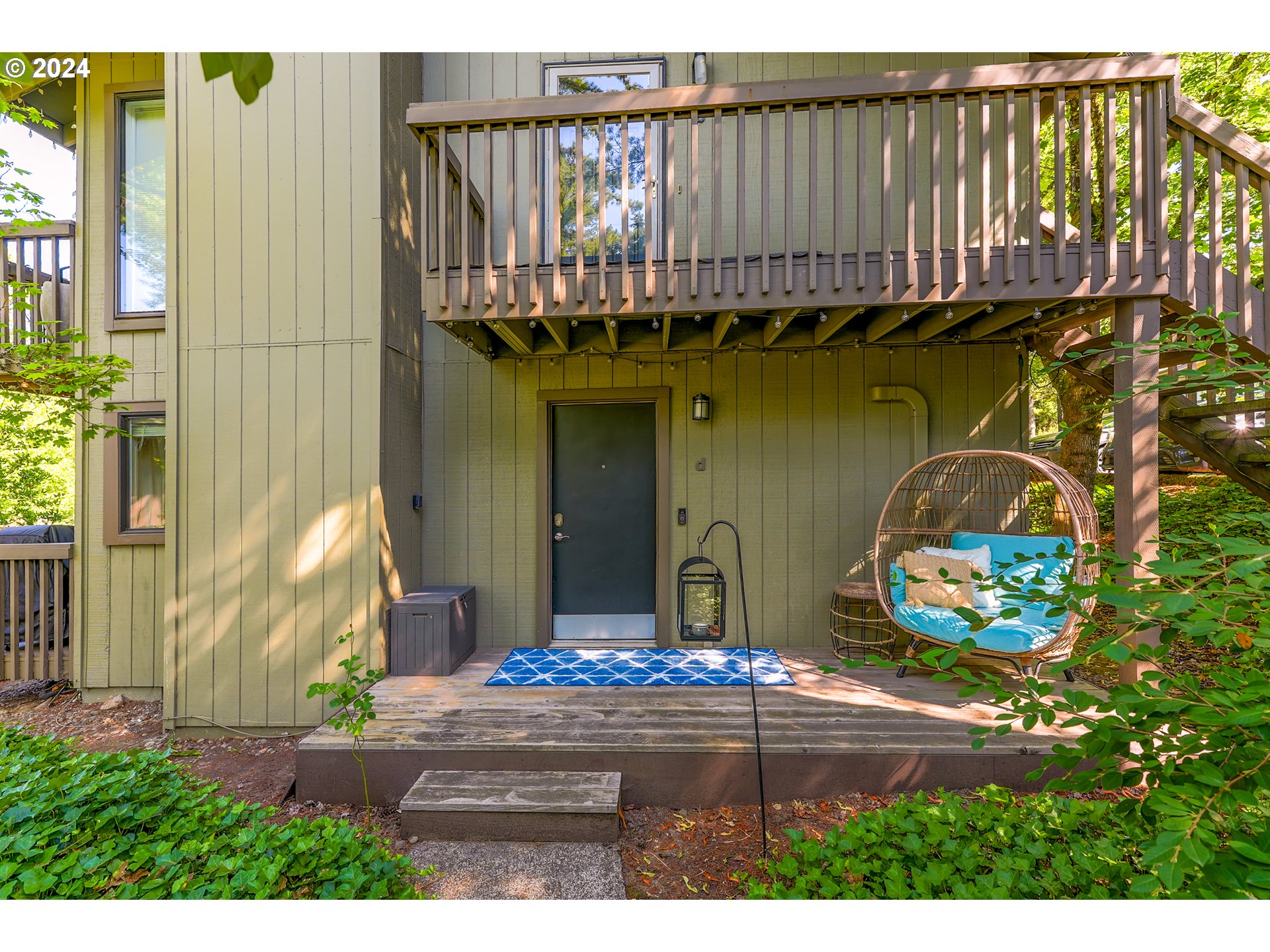 7702 Southwest Barnes Road, Unit D Portland, OR 97225 - Photo 16 of 24 a bird view of a house with a balcony