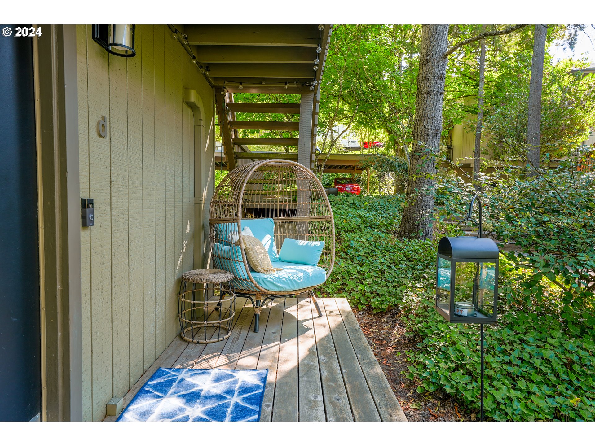 7702 Southwest Barnes Road, Unit D Portland, OR 97225 - Photo 17 of 24 a view of a porch