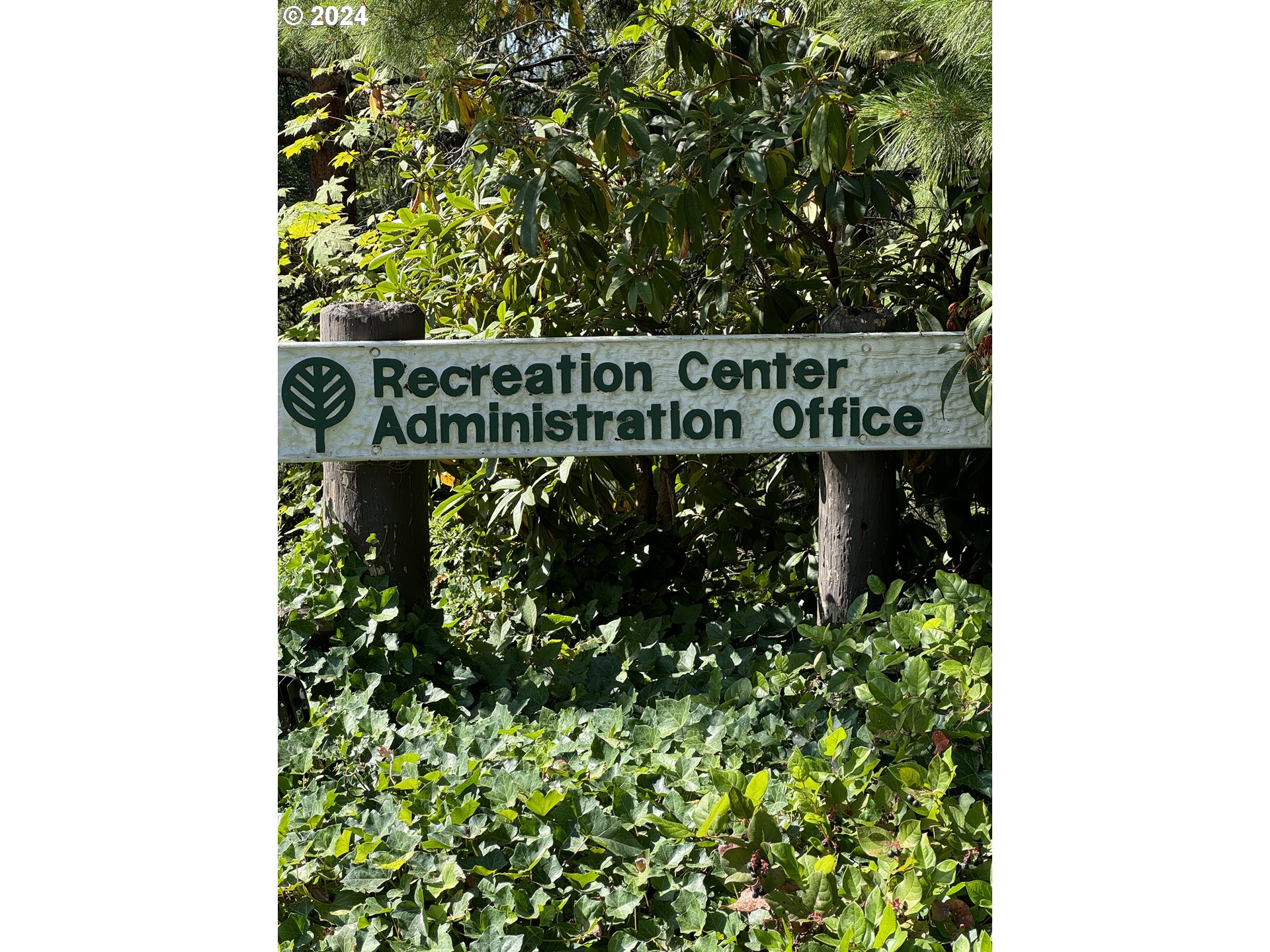 7702 Southwest Barnes Road, Unit D Portland, OR 97225 - Photo 19 of 24 a street sign that is on a pole