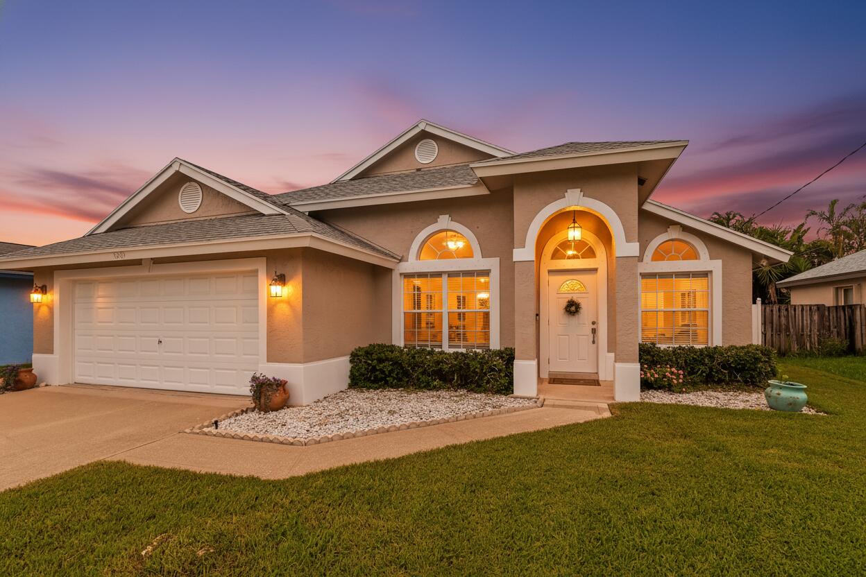 6319 Foster Street Jupiter, FL 33458 - Photo 1 of 24 03 Front 03_TW