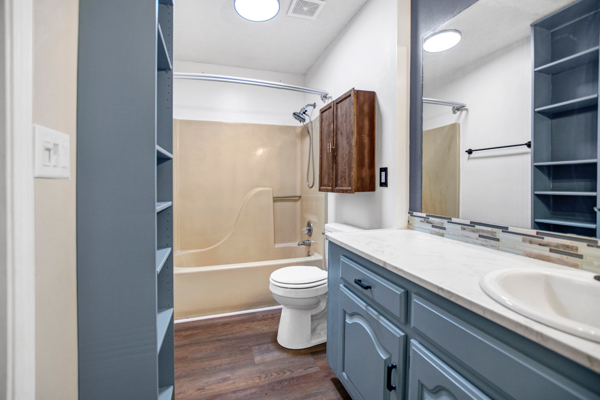 128 South Richview Road Clarksville, TN 37043 - Photo 14 of 19 a bathroom with a sink a toilet and shower