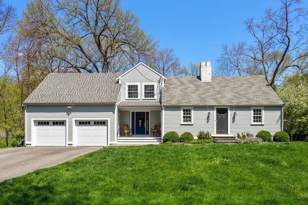 4 Granison Road Weston, MA 02493 - Photo 1 of 37 a view of a house with a yard and potted plants