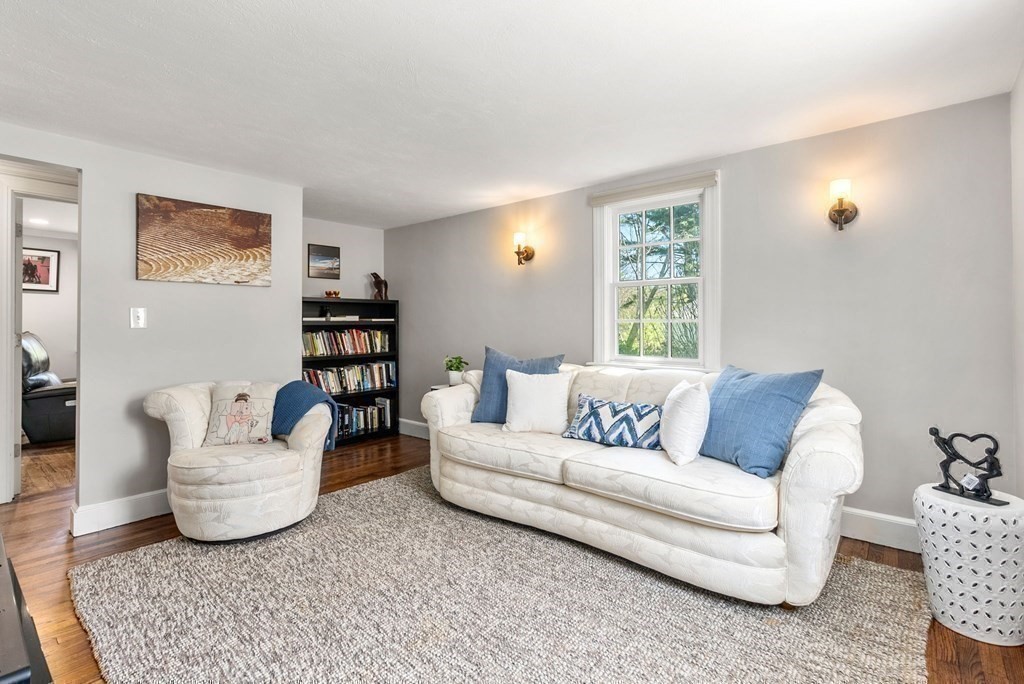 4 Granison Road Weston, MA 02493 - Photo 15 of 37 a living room with furniture and a couch