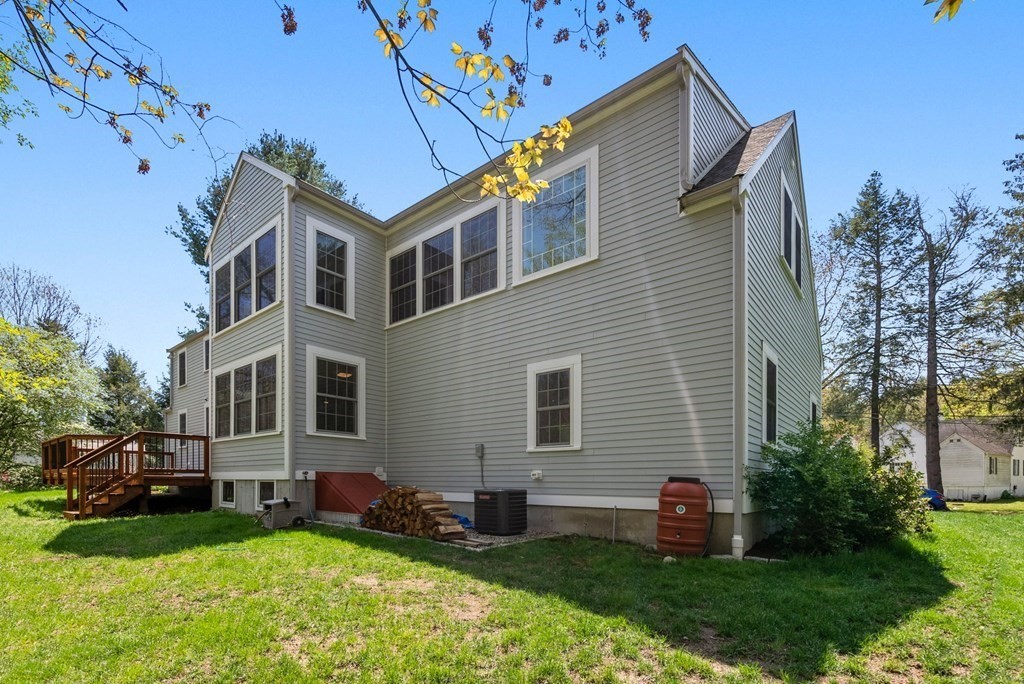 4 Granison Road Weston, MA 02493 - Photo 36 of 37 a front view of a house with a yard