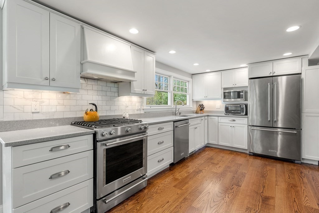 4 Granison Road Weston, MA 02493 - Photo 8 of 37 a kitchen with a stove sink and refrigerator