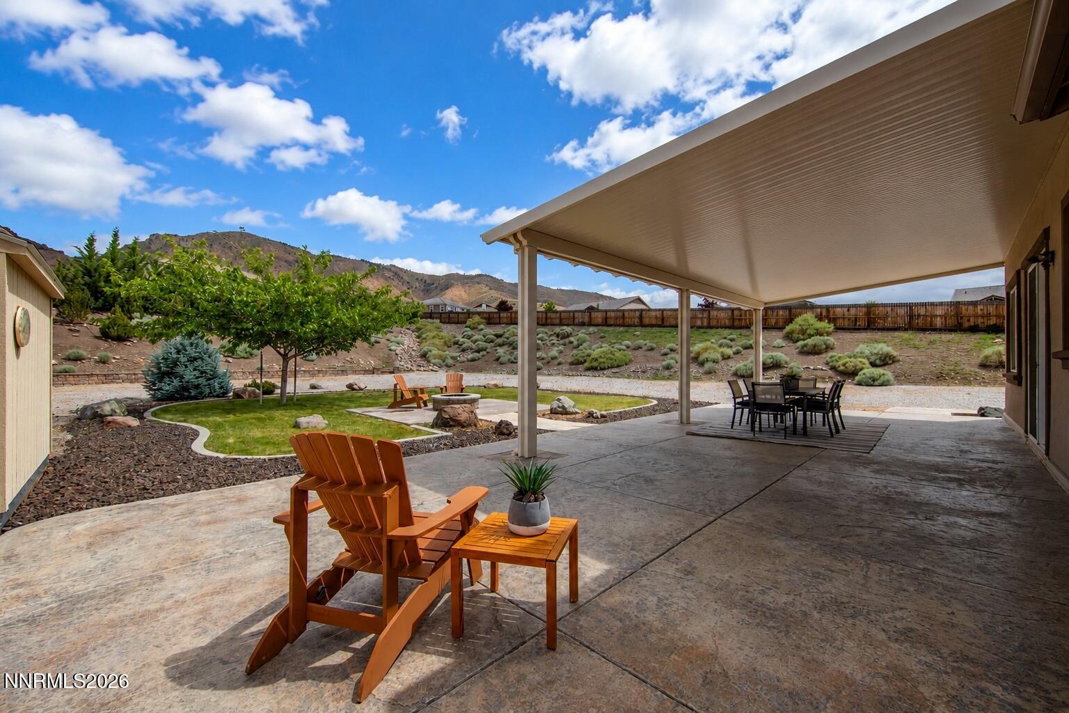 10150 Barrel Racer Drive Reno, NV 89521 - Photo 2 of 64 a view of a backyard with sitting area