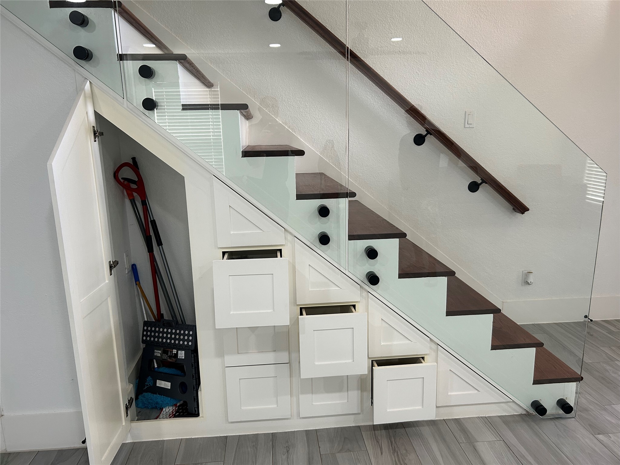 16346 St Helena Way Houston, TX 77053 - Photo 11 of 33 STORAGE DRAWERS/BROOM CLOSET UNDER STAIR