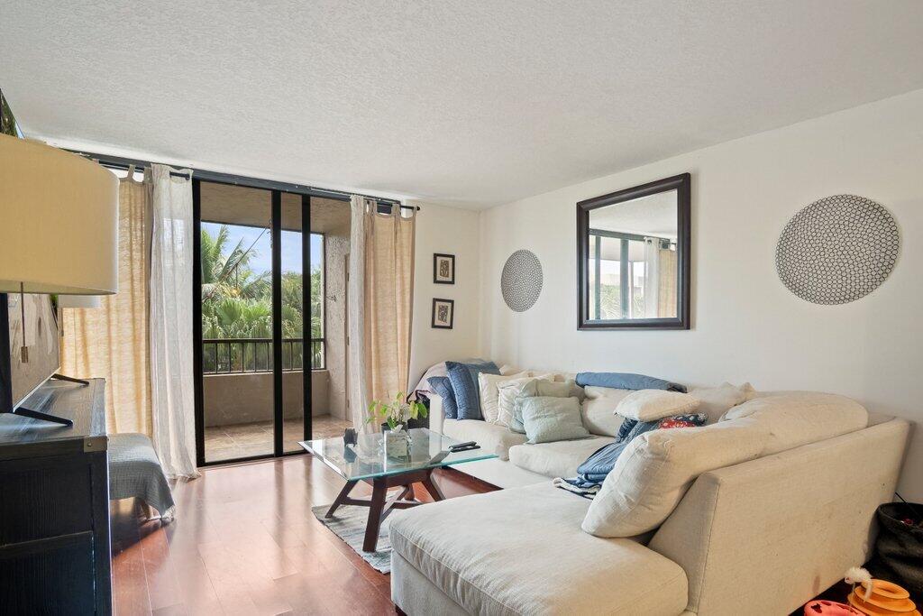 2070 Homewood Boulevard, Unit 4100 Delray Beach, FL 33445 - Photo 15 of 45 Living Room to Patio.jpeg-SMALL