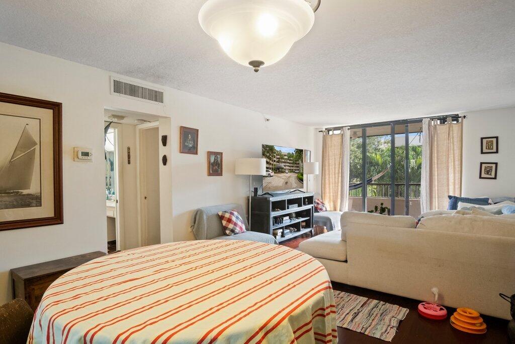 2070 Homewood Boulevard, Unit 4100 Delray Beach, FL 33445 - Photo 21 of 45 Dining to Living.jpeg-SMALL