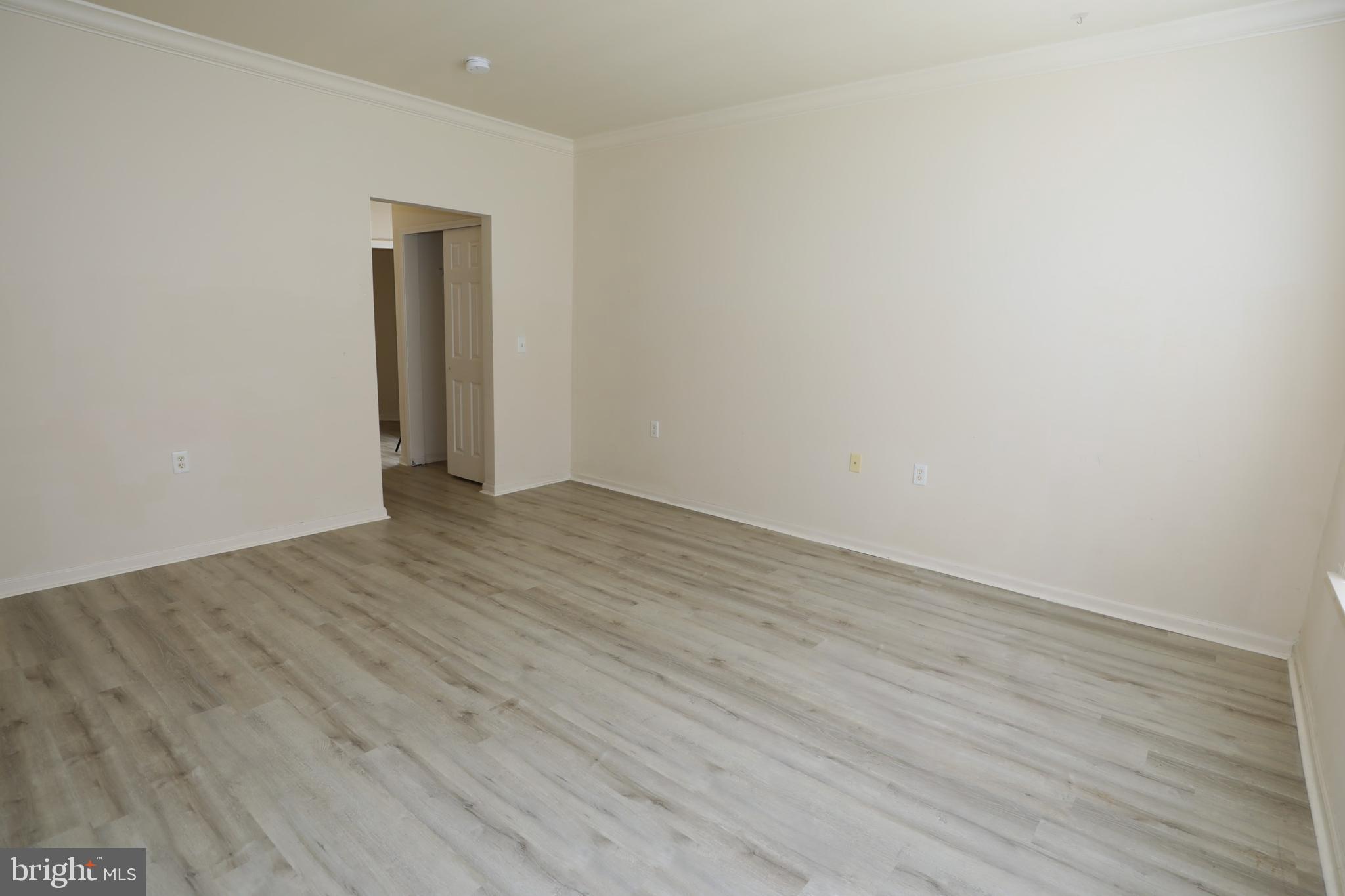 611 Masterson Court Ewing, NJ 08618 - Photo 16 of 38 a view of an empty room with wooden floor