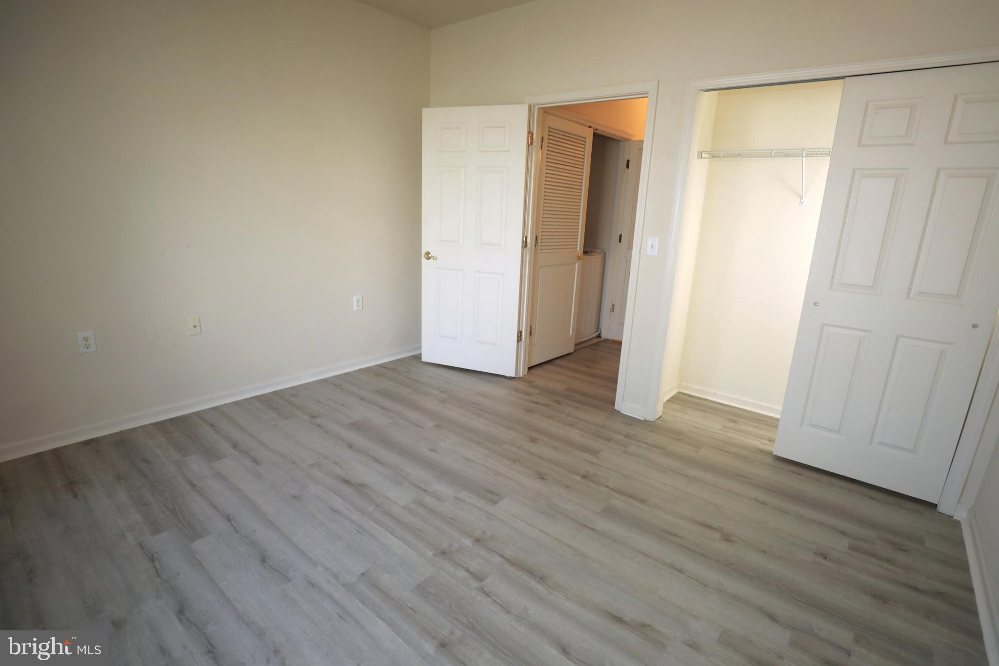 611 Masterson Court Ewing, NJ 08618 - Photo 29 of 38 a view of an empty room with wooden floor