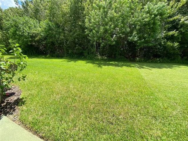 a view of a house with a swimming pool