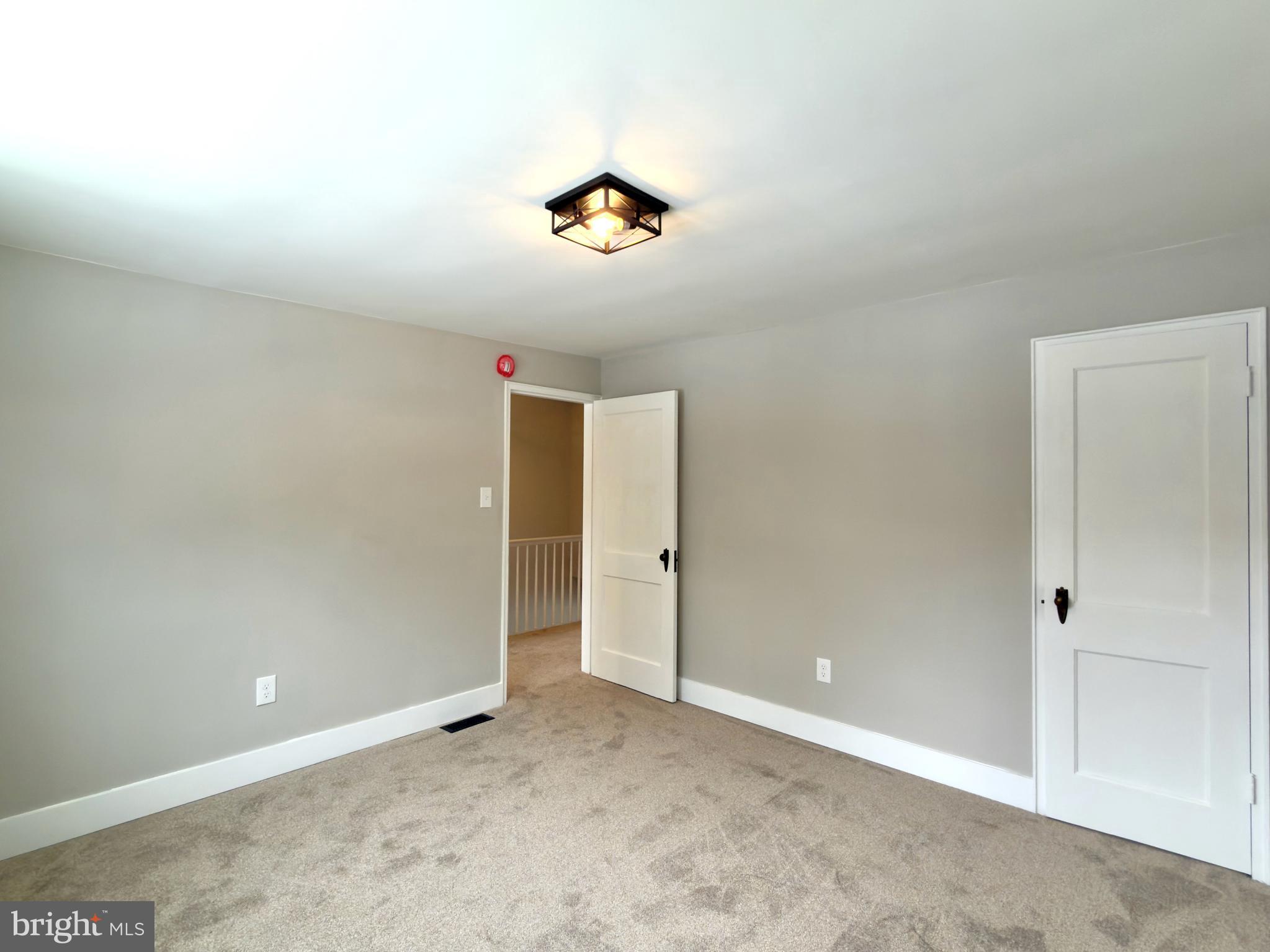 244 Sycamore Road Reading, PA 19611 - Photo 13 of 27 an empty room with a window