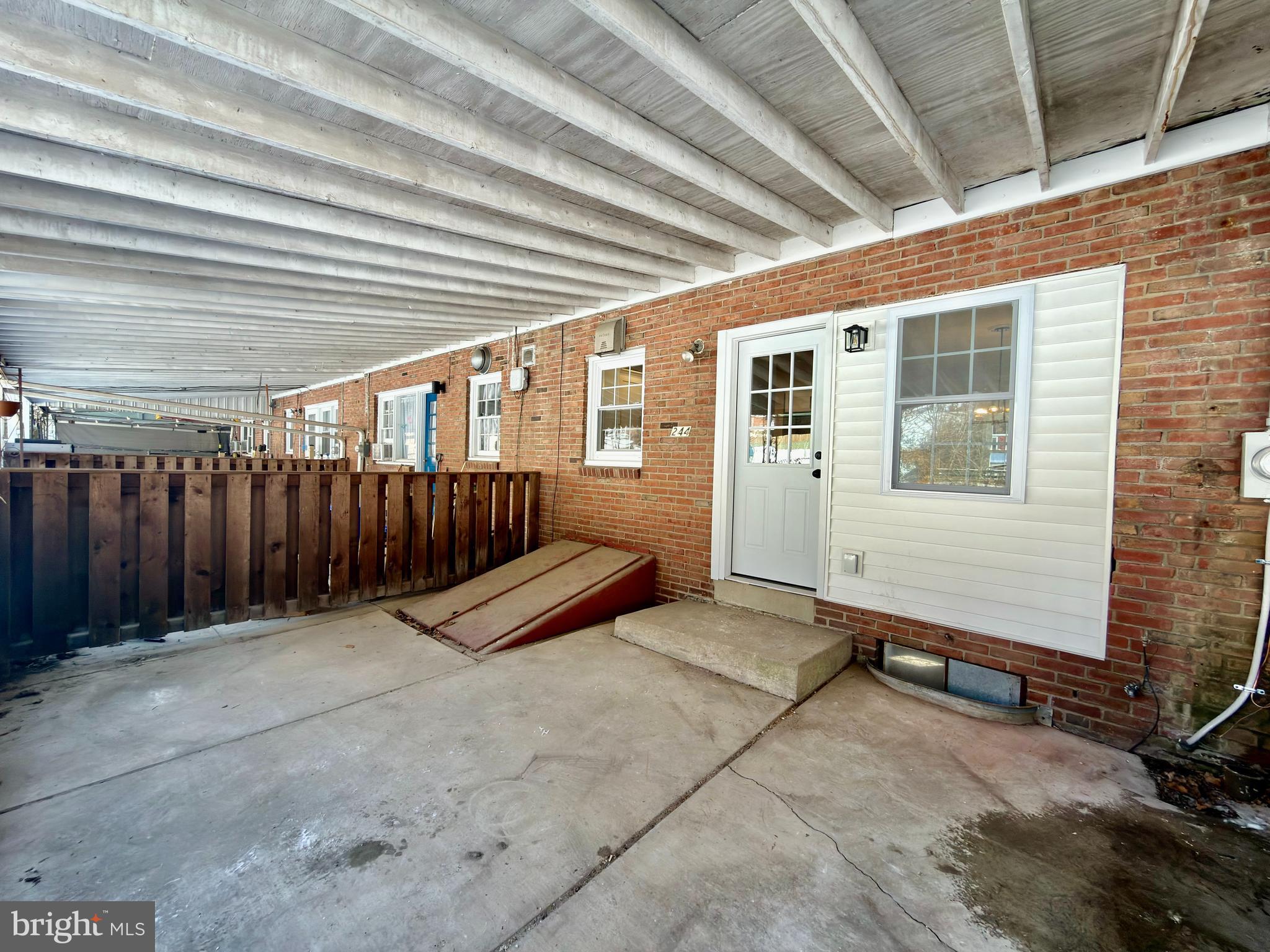 244 Sycamore Road Reading, PA 19611 - Photo 26 of 27 a view of a backyard with wooden fence