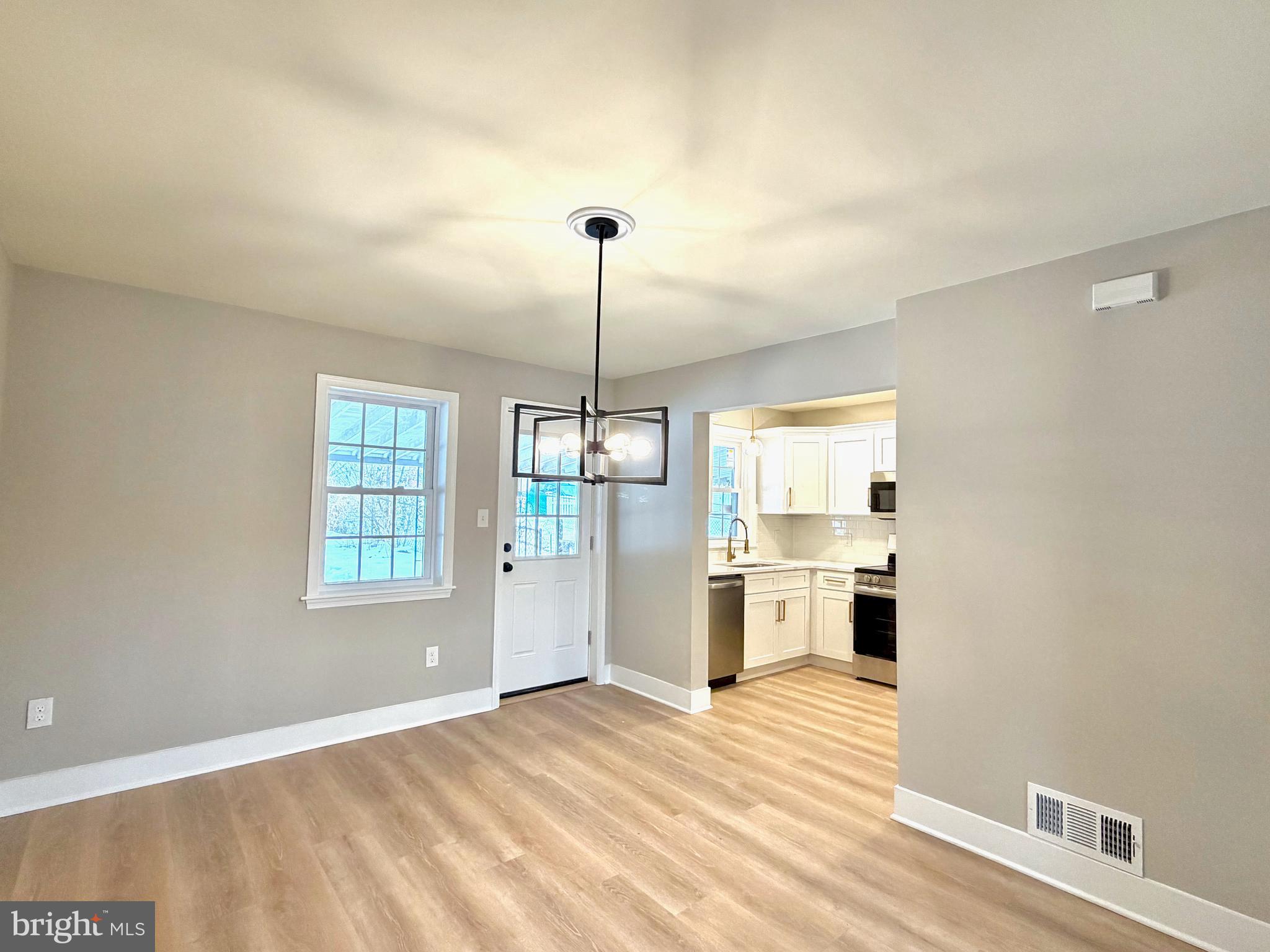 244 Sycamore Road Reading, PA 19611 - Photo 6 of 27 a view of a kitchen with a sink and a window