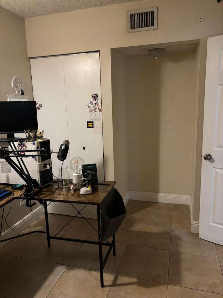 8400 Southwest 133rd Avenue Road, Unit 202 Miami, FL 33183 - Photo 18 of 23 a living room with furniture and a window