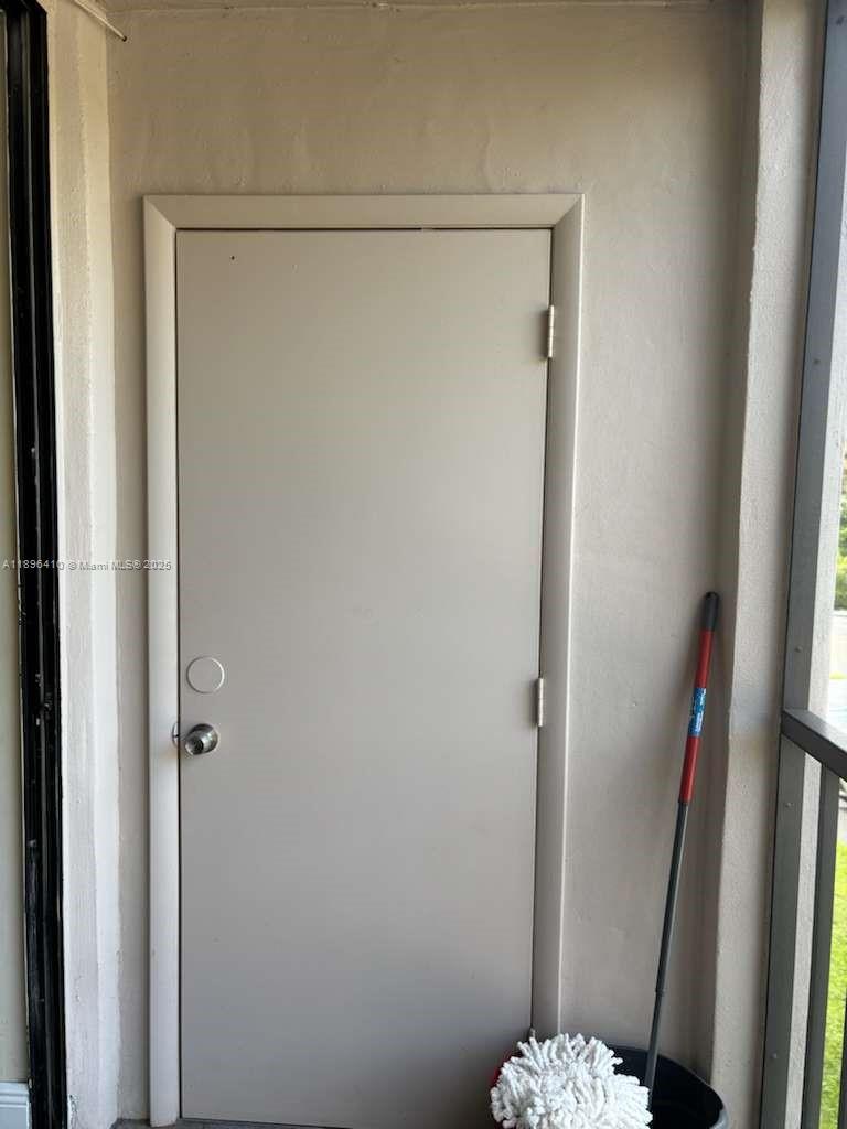 8400 Southwest 133rd Avenue Road, Unit 202 Miami, FL 33183 - Photo 22 of 23 a bathroom with a glass shower door