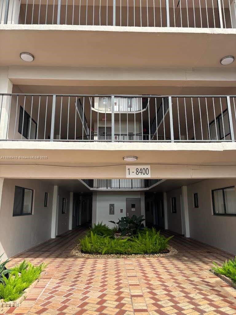 8400 Southwest 133rd Avenue Road, Unit 202 Miami, FL 33183 - Photo 3 of 23 a view of house with backyard and deck