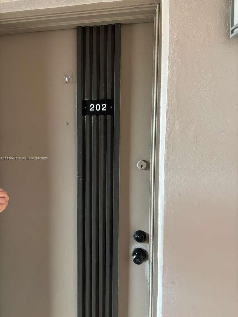 8400 Southwest 133rd Avenue Road, Unit 202 Miami, FL 33183 - Photo 8 of 23 a view of a hallway